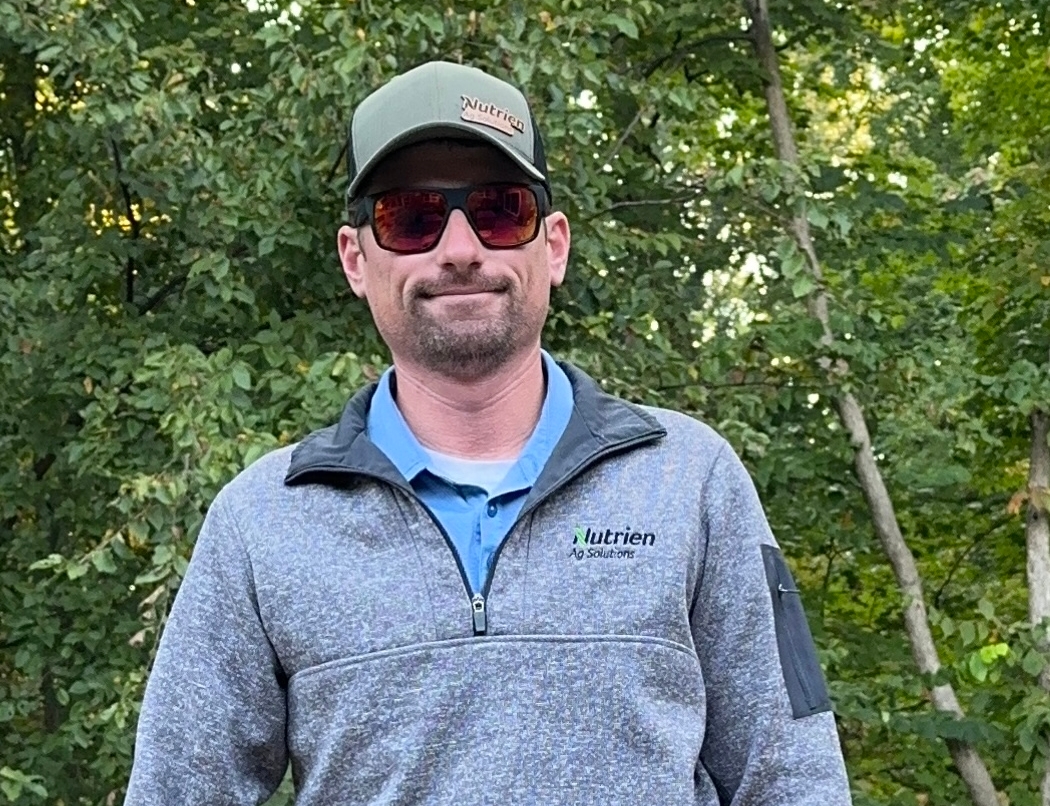 Thaddeus Bates standing on Dynagro field